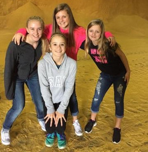 girls with grain piles